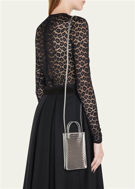 alaia perforated crossbody bag